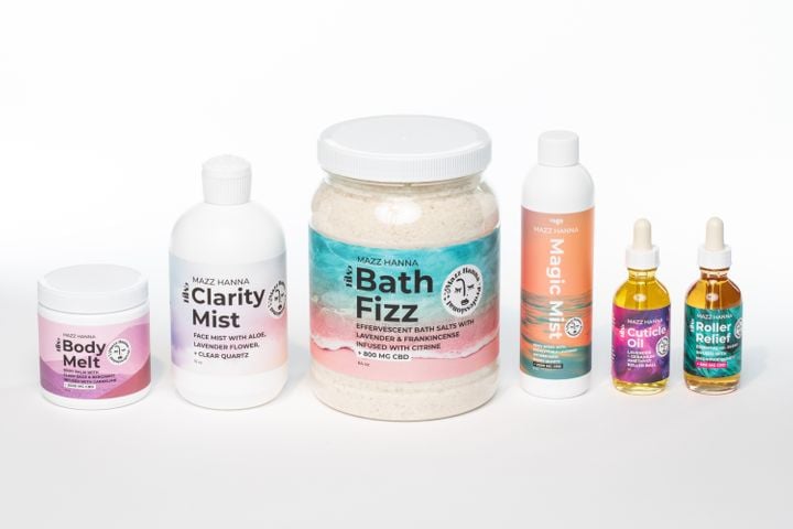 The collection of products used in Mazz Hanna's Crystal Healing Manicure and Pedicure services