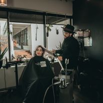 Daniel Montes, Owner of Hair by Daniel M, works on a client in his Sola Salon Suite.