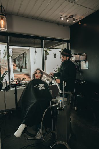 Daniel Montes, Owner of Hair by Daniel M, works on a client in his Sola Salon Suite.