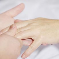 Hands get treated with skincare ingredients that promote healthy skin barrier.