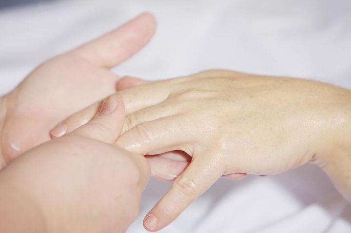 Hands get treated with skincare ingredients that promote healthy skin barrier.
