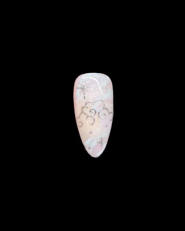 Step 6: Fill in the extra space with some dots and starbursts, topcoat with your favourite shiny...
