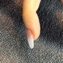 Melissa Finch of Estilo Salon and Spa, Altoona, Iowa, used a tip to correct her client’s ski...