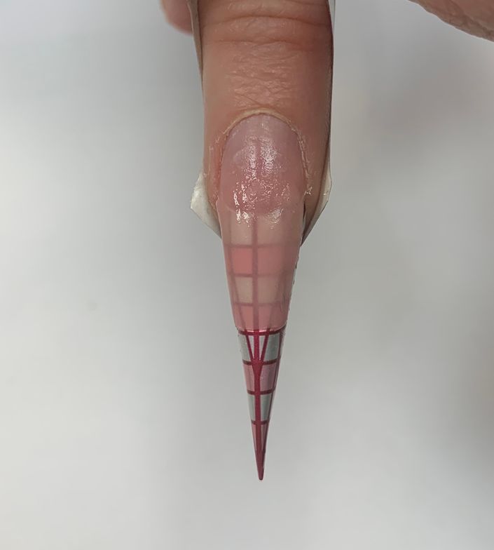 Step 10/10A: Apply the first bead of cover pink at the free edge. Create the taper on the form.
