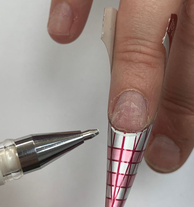 Step 5: Using KB Form Tailoring White Gel Pen draw around the shape of the free edge.  Using a...