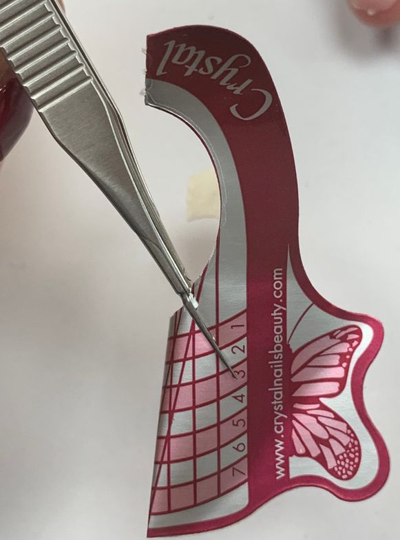 Step 8: Using KB Straight Form Tailoring Scissors, make approximately a 1cm long cut at a...
