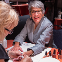 Senator Jackson receives a CND Shellac mani from Jan Zanettini, sales manager, school division,...
